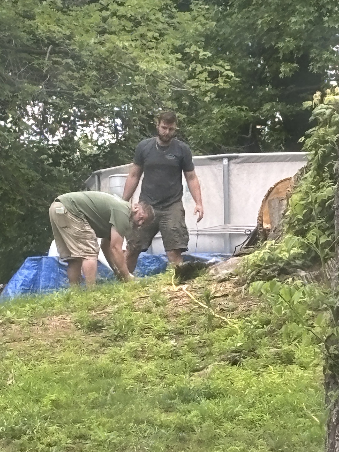 Father and son team working together on a Grizzly General Contracting project